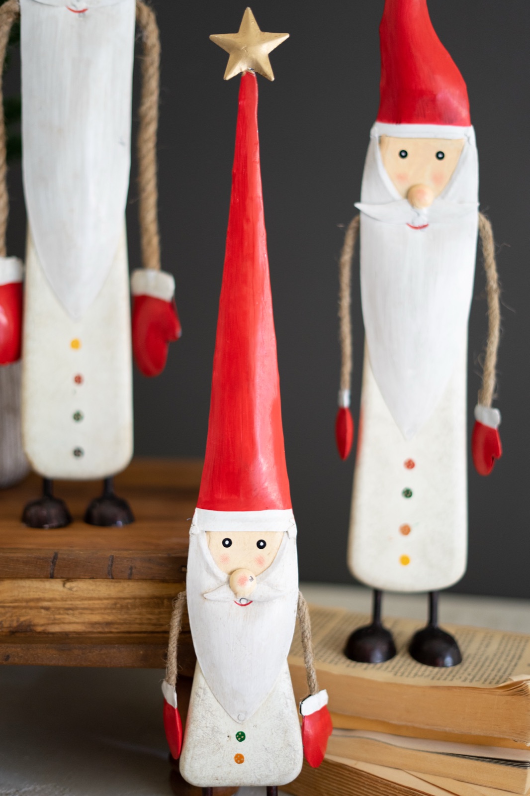 Set of Three Painted Metal and Wood Santas with Rope Arms